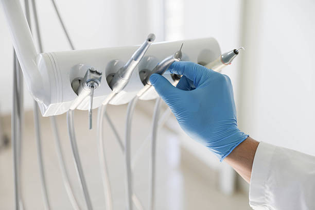 Professional Tooth Extraction technician working in Leelanau County County, MI